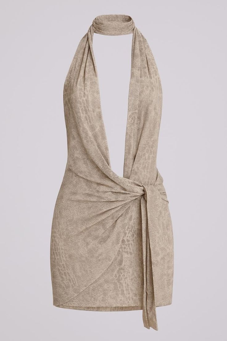 Beige halter neck mini dress with a deep V-neck and knot detail