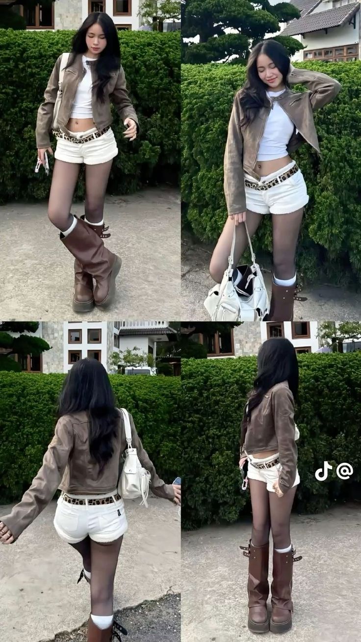 Woman in a brown jacket and white shorts posing outdoors