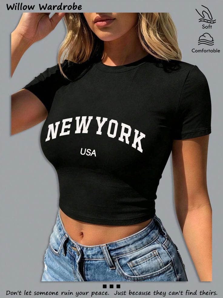 Woman in a black crop top and denim shorts with exposed midriff