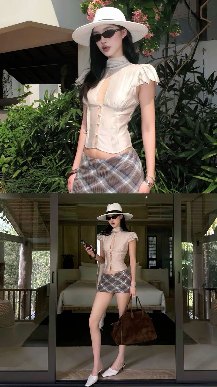 Woman in a white hat and plaid mini skirt posing outdoors at a resort