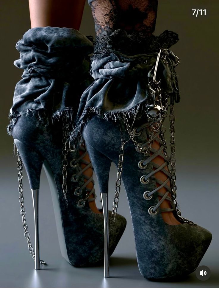 Pair of gothic platform high heels with chains and skull charms