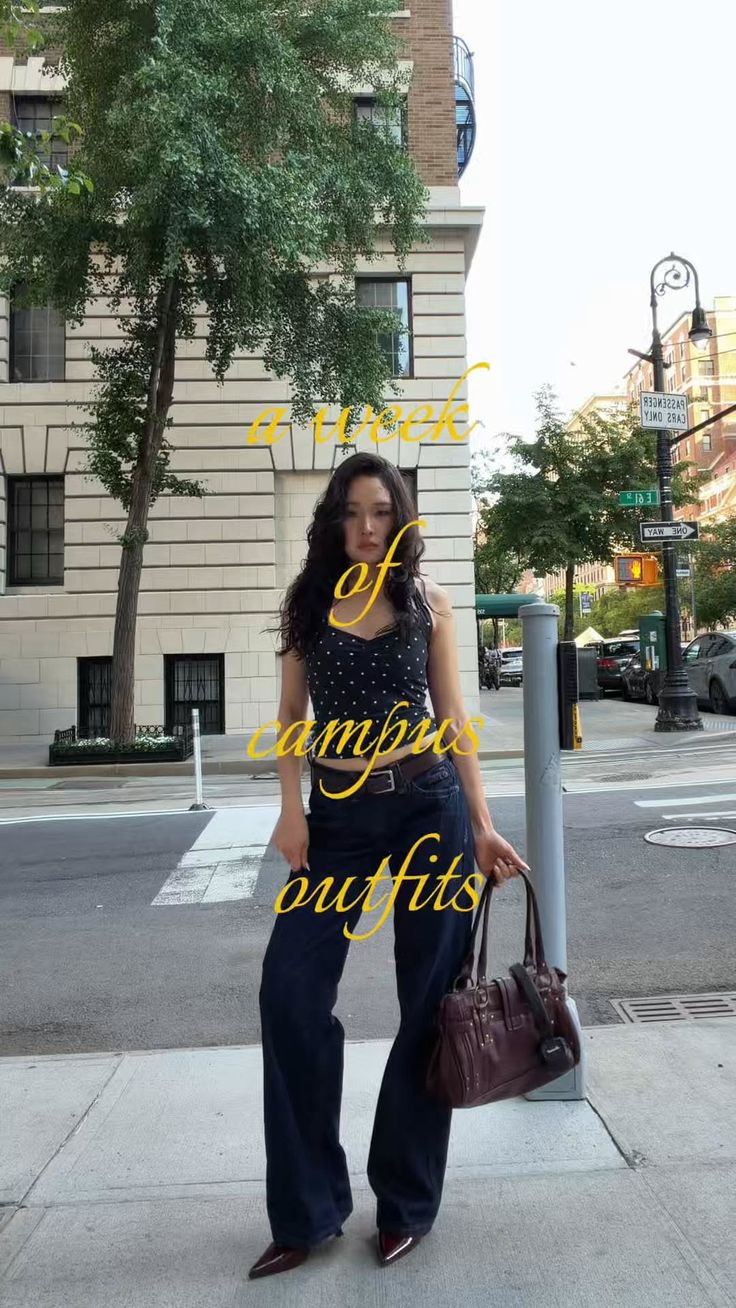 Woman in a polka dot top and wide leg pants on a city street