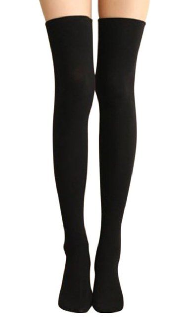 Pair of legs wearing black thigh-high socks on a white background