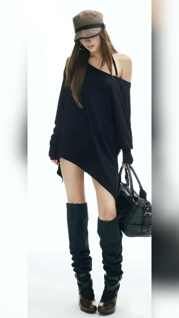 Woman in an off-shoulder top, hat, and boots holding a handbag