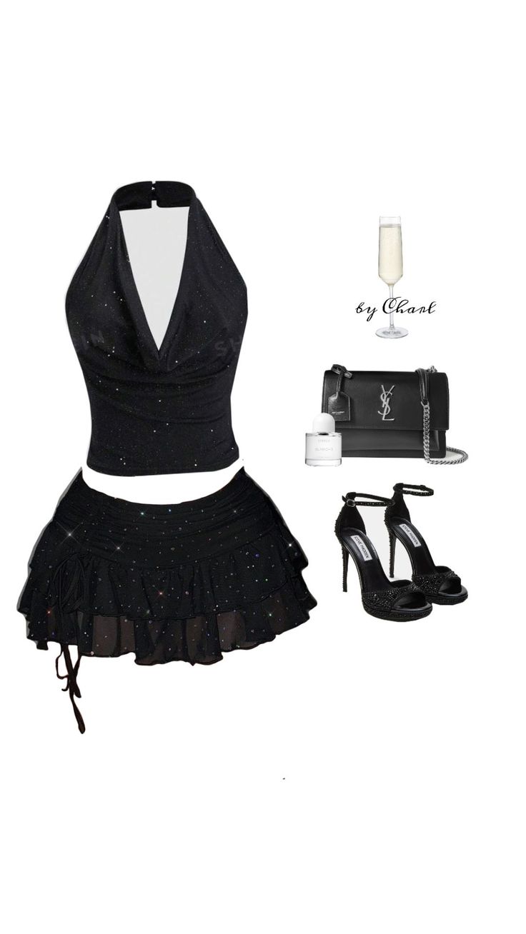 Black sparkly halter top and mini skirt with accessories on a white background