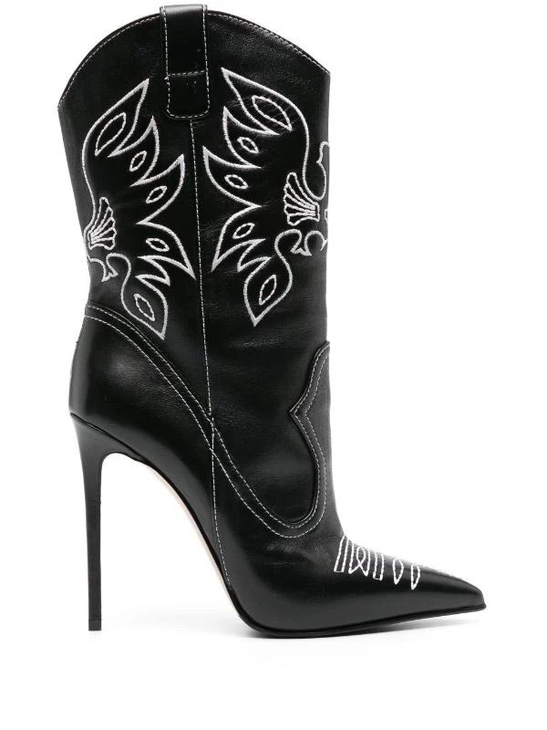 Black leather cowboy boots with white stitching and a stiletto heel