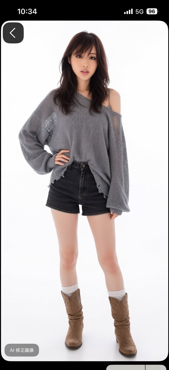 Woman with long hair wearing a gray sweater, denim shorts, and cowboy boots