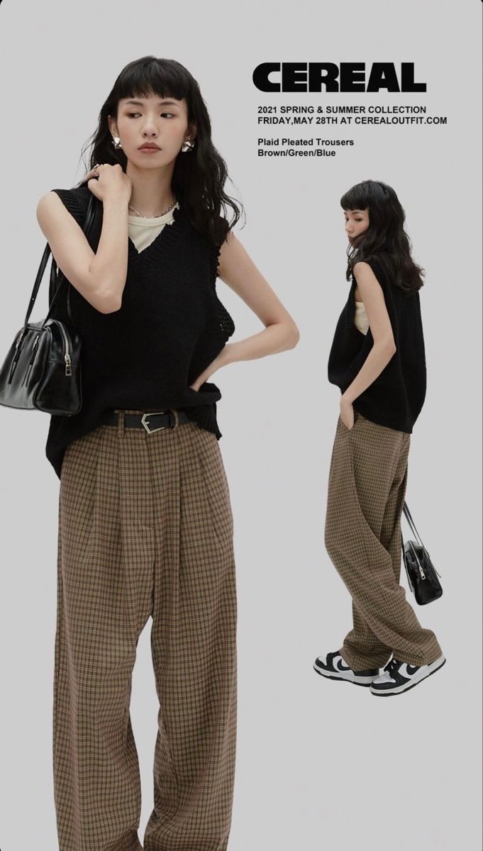 Two women in black vests and plaid trousers posing in a studio