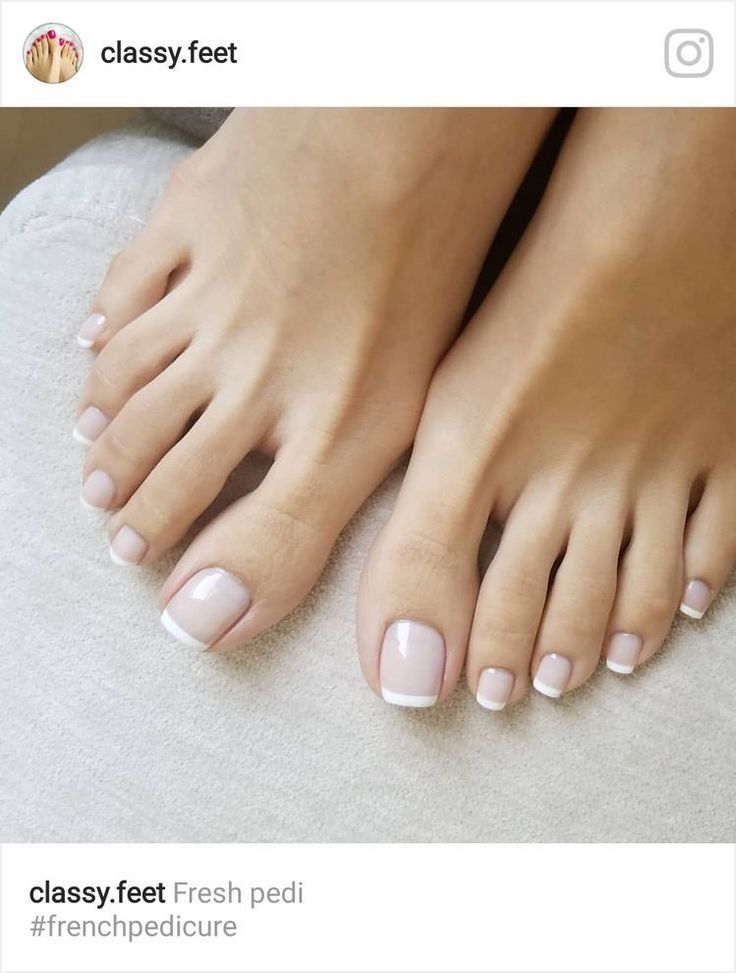 Close up of feet with a fresh french pedicure