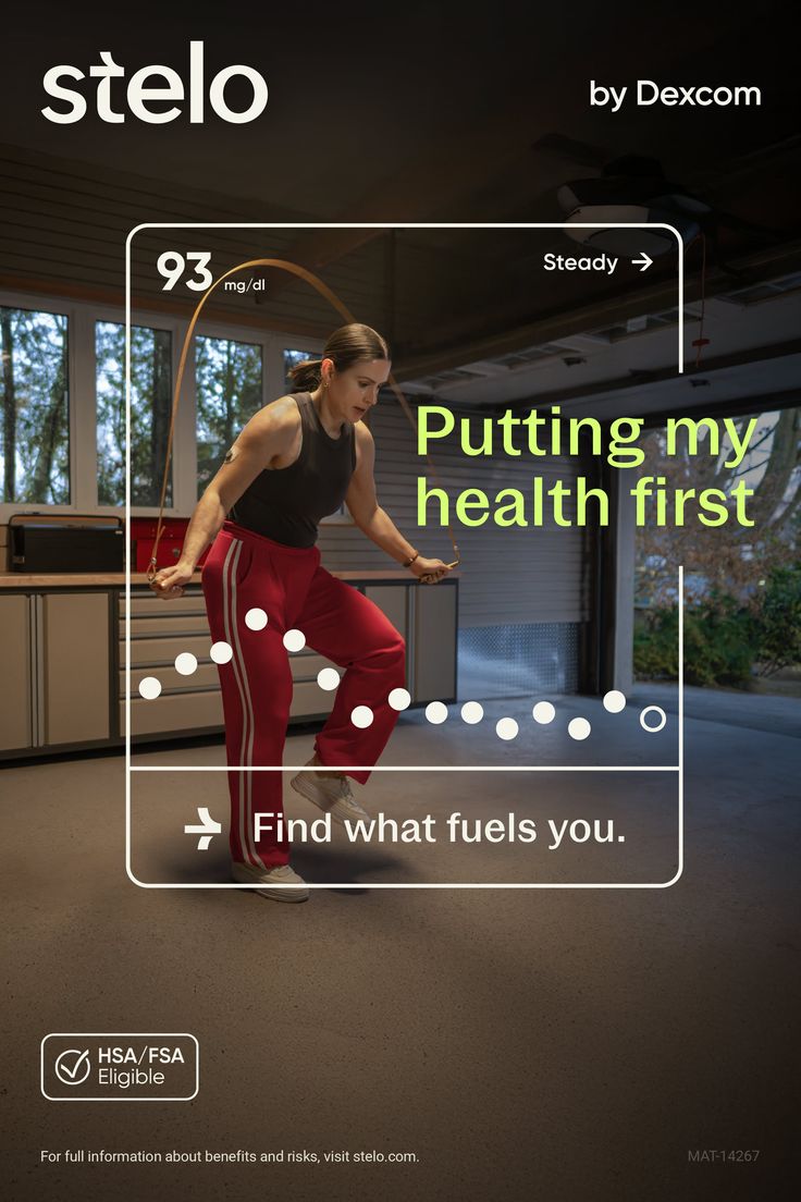 Woman jumping rope in a garage gym, with a health monitoring display