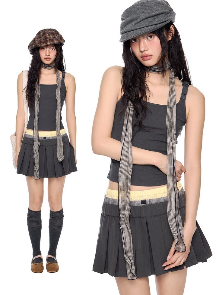Woman in a tank top, pleated skirt, and plaid hat against a white background