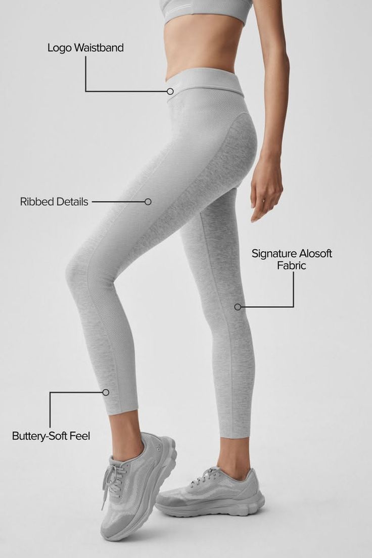 Woman in light gray athletic wear and sneakers on a white background