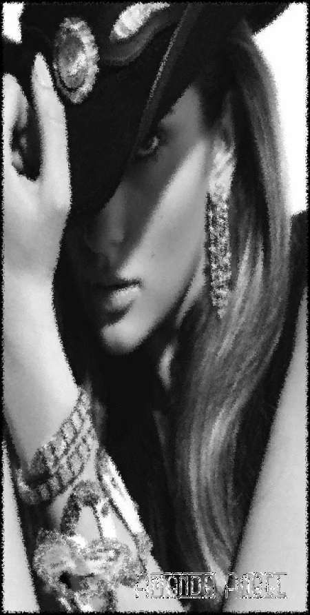 Woman in a cowboy hat with dramatic lighting in black and white