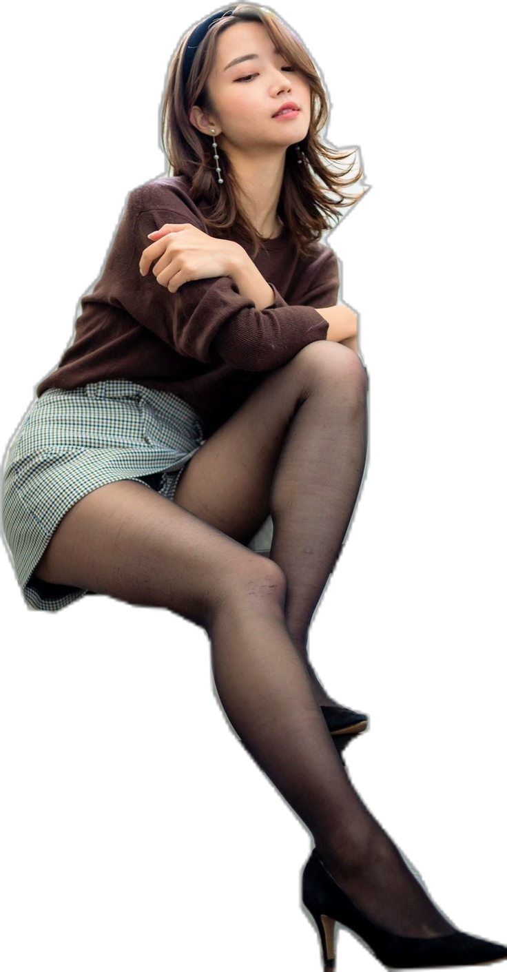 Woman in a brown sweater and plaid skirt with black pantyhose and high heels