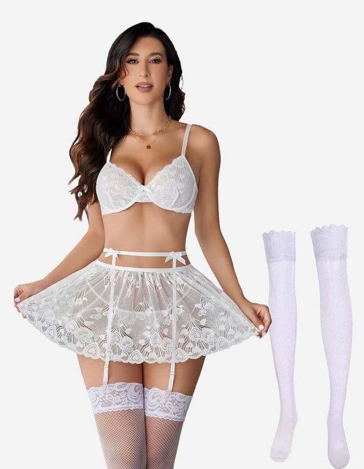 Woman in white lace lingerie set with fishnet stockings