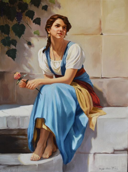 Woman in a blue dress sitting outdoors, holding a pink rose