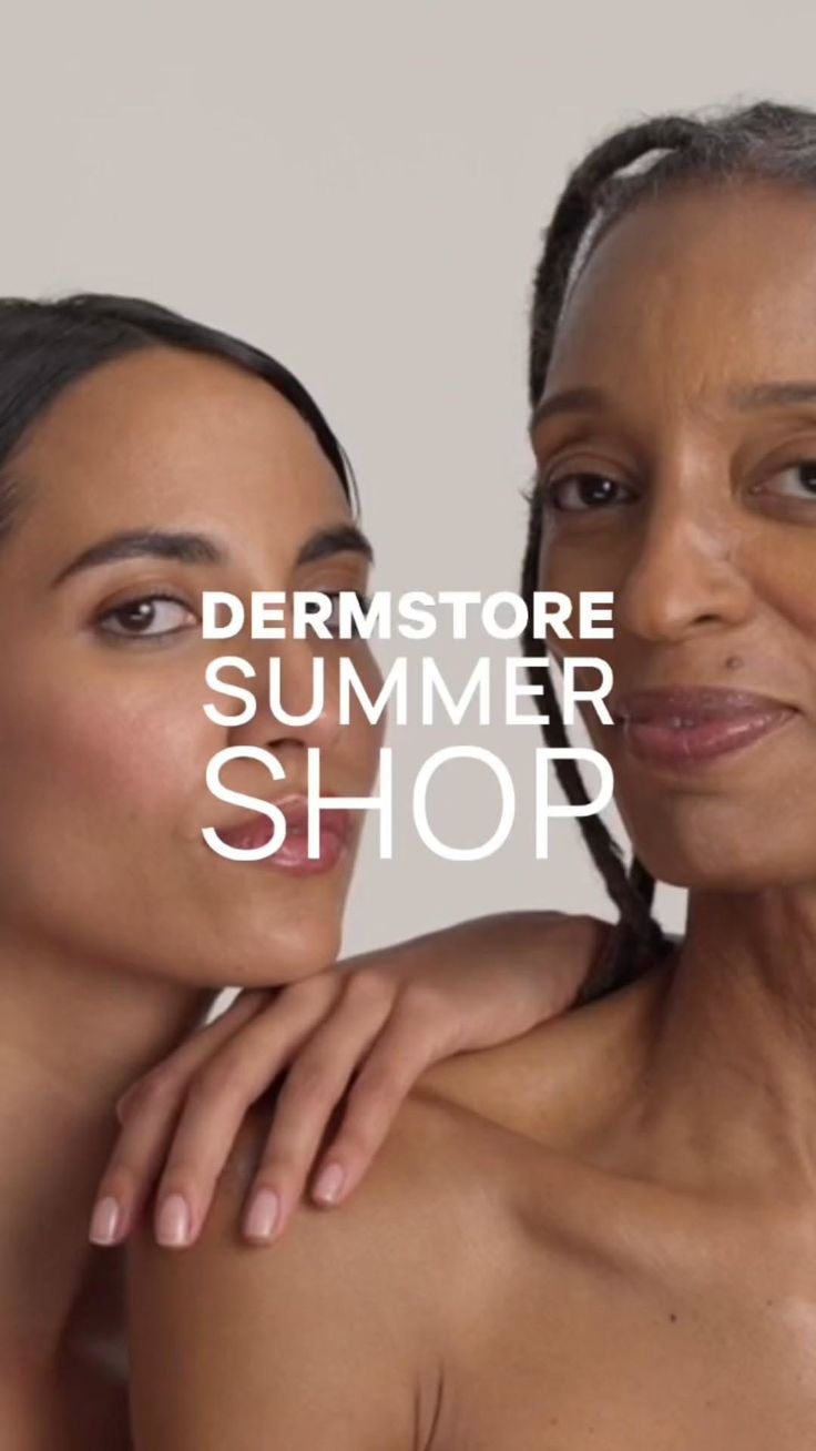 Two women with bare shoulders and natural makeup against a light background