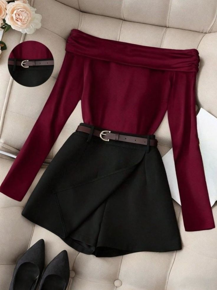 Maroon off-shoulder top with a black skort and brown belt, paired with black heels