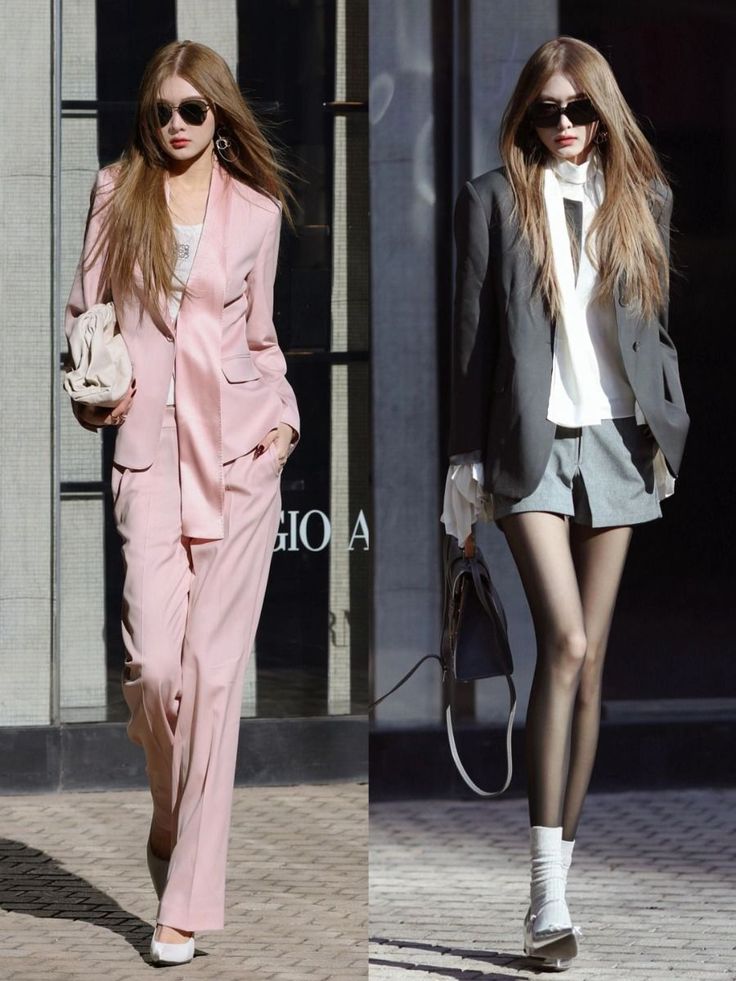 Two women in stylish outfits and sunglasses walking on a street