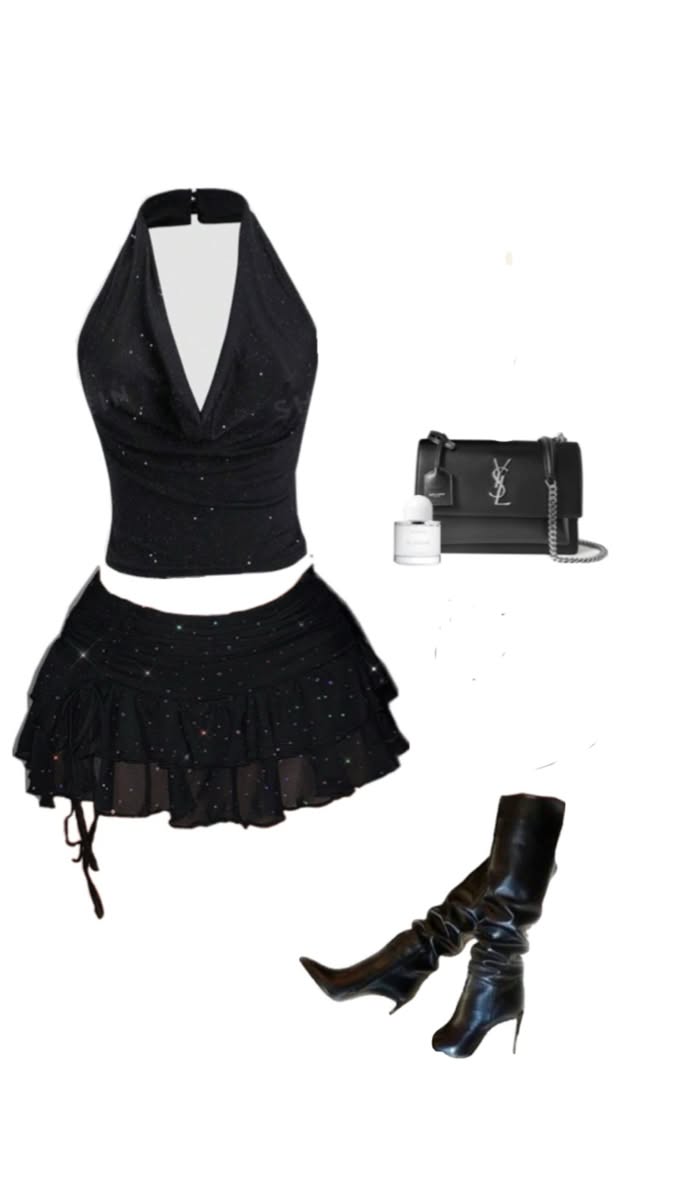 Black halter top and mini skirt with matching boots and handbag