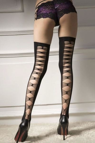 Woman in black lace lingerie and patterned stockings with high heels