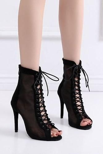 Pair of black lace-up peep-toe ankle boots with stiletto heels